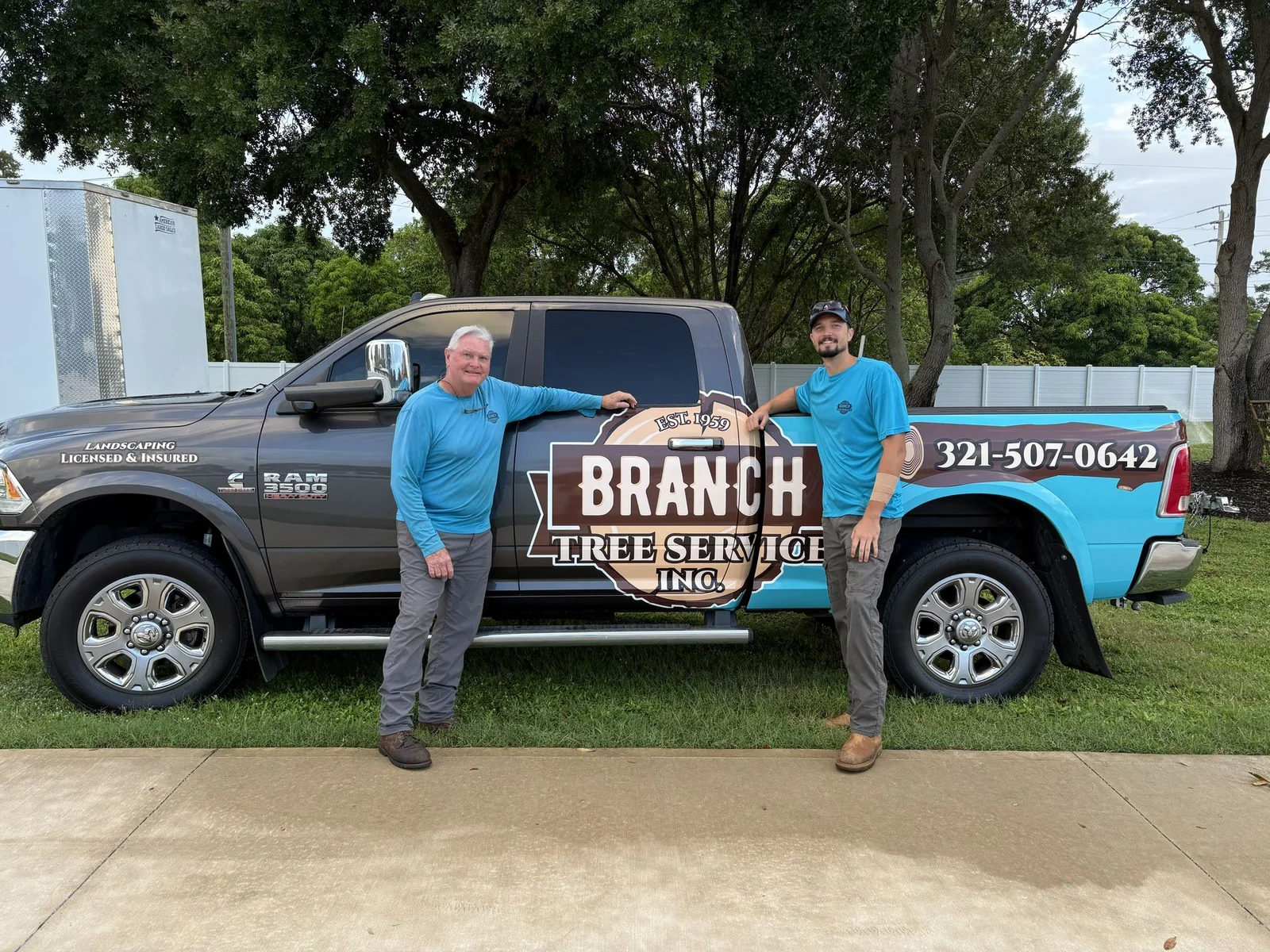 Branch Tree Service crew with their branded truck in Brevard County, FL